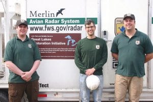 Three U.S. Fish & Wildlife biologists are spending several days setting up a radar system on Dave and Cathi Williams’ farm that will track the migration of birds and bats that come across, or along, the shore of Lake Superior. The Twin Cities trio will come back periodically to check the equipment and data over the next month. From L-R: Nathan Rathburn, Kevin Heist and Mike Wells.