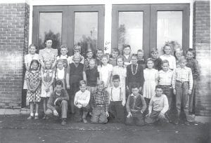 This Oct. 13, 1943 photo of the fifth- and sixth-graders at Grand Marais School was taken by Milford Humphrey and is being shared with News-Herald readers by Kenneth Skoog. Pictured are, front row from left, Bertil Horseng, Clyde Olson, Dick Bockovich, Merle Potter and Jerry Anderson. In the middle row, from left, are Shirley Bloomquist, Shirley Kluck, Shirley Ott, Janet Lind, Jean Berg, Dorothy Backlund, Fern Shold, Faye ?, Carol Eckmark, George Stoltz and Dick Lund. In the back row, from left, are Arlene Backlund, Mrs. Mabel Sjoberg (teacher), Alex Sjoberg, John Lindell, Virgil Lindquist, Kenneth Skoog, Bobby Brazell, Leroy Creech, Bill McNerey, Roger Larson, Bill Anderson, John Underwood, and John Henry Eliason.