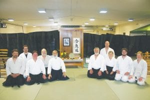 Members of the Grand Marais Aikido Dojo gathered for a photo during the 25th anniversary of the local dojo. More than 50 people attended the three-day celebration. From L-R: Randy Spry, Josh Brandner, Steve Waver, Steve Frykman, Sensi Rev. Zenco N. Okimura Shihan, 7th Dan, from the World Aikido Aikikai Inc.; across the aisle L-R: Craig Waver, Chris Skildum, Joanne Smith, Westin Waver, and Mary Reichert.