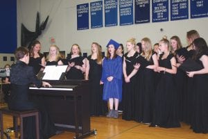 With choir director Erika Ternes playing piano the Cook County High School choir blessed the crowd gathered for the 2018 senior graduation ceremonies with a song. The lone senior in the choir was Veronica Lopez. Lopez is wearing her cap and gown.