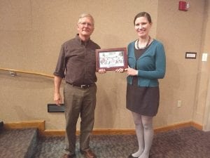 Dorian Grilley, executive director of the Bicycle Alliance of Minnesota, presented the Bicycle Friendly Community Champion award to Maren Webb on Saturday, June 2, in Saint Paul at the alliances annual meeting.