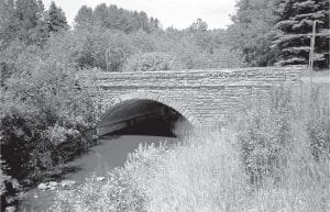 In an effort to preserve and repair the wondrous stone bridge in Grand Portage, a team of highly skilled historic preservationists, craftspeople and volunteers will disassemble, repair, and then reassemble the 80-year-old stone span this summer.