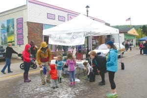 The Violence Prevention Center had a bubble-blowing booth set up for little kids and big kids during the Grand Marais block party held on Saturday, June 9. It was a big hit, although it was cold enough to make a bubble’s round luminous cheeks shiver and quiver because of the cold weather. Still, lots of beautiful bubbles were created, bobbling and bumbling, bouncing and flouncing through the air down the billowy, blustery bubbly street toward the lake, which greatly pleased both little kids and big kids. There was a variety of booths and live music for patrons to enjoy during the day-long party. Unfortunately the cold and at times rain kept a lot of people away. Still, the first-time event was something to build upon, and next year — weather permitting — it should be bigger and better and bubblier than ever.