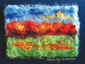 Local artist Bonnie Hedstrom did one of the pieces that will be displayed at the Fiber Guild exhibition. Her work, depicted above, is called The promise of fall.