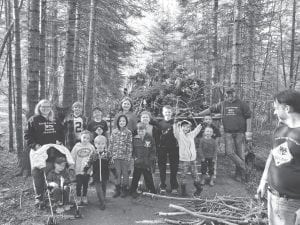 Care Partners of Cook County designated the second week of June as Senior Spring Cleanup Week. Lots of local seniors received yard chores from volunteers in the community. One of the groups to volunteer was Cub Scout Pack 167. One of the troop leaders, Tina Hegg, said, “They did an amazing job at their spring service project clearing the woods of fallen brush for one of our Grand Marais seniors. Scout families filled a flatbed provided by Cook County Towing with debris stacked several feet high in just 45 minutes’ work!”