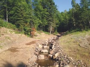 To help reduce the turbidity of Poplar River step pools were built this summer on a major tributary to the river. The step pools lower the chance of silt and mud sediment to flow into Poplar River, thereby increasing the clarity of the water in this popular trout stream.