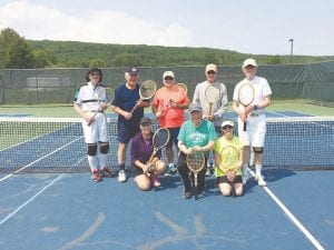 The Cook County Tennis Association held its second annual Wooden Racket event on Saturday, June 23. Participants ranging in age from the 80s to under 12 came out to show off their skills with their vintage wooden tennis rackets. “We had a blast!” said event organizer Kathy Bolstad. Front row L-R: Jan Hadley, Dick Swanson, and Jennifer Plahuta. Not pictured, Kyle Oberg. Back row L-R: Rod Wannebo, Charlie Darley, Robert Reed, Carl Johnson, and Mike Carlson.