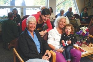 Among the throngs of attendees who came to the 40th anniversary celebration held for Sawtooth Mountain Clinic on Monday evening, June 25, were four generations of beautiful, strong women. Pictured from L-R: Arline Johnson, Clare (Hansen) Shirley, and Cindy Hansen, who is holding her granddaughter, Kit Shirley.