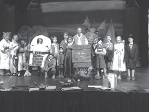 It takes a lot of hard work, but bit-by-bit the play is coming together. Above, some of the cast of Shrek The Musical is onstage testing out the costumes and props in the first technical rehearsal. Right: John Bragstad practices playing the part of Lord Farquaad.